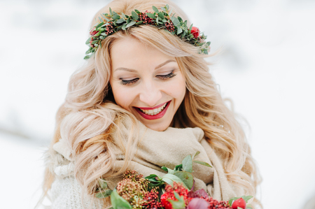 portrait of a bride in a winter forestの写真素材