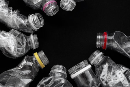 Compressed plastic bottles in the shape of a sun or watch.