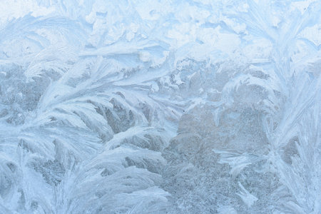 Abstract frosty pattern on glass, background texture