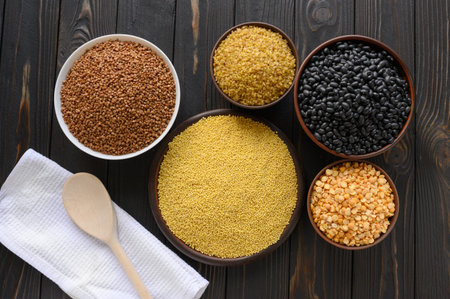 Fresh organic natural beans on wooden rustic black background