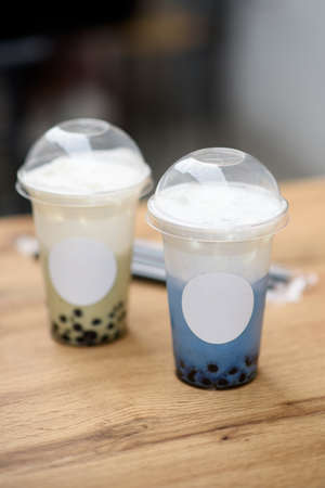 Butterfly pea milk bubble tea with tapioca pearls. Place for a logoの写真素材