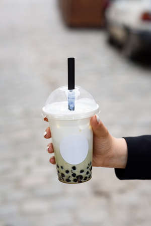 Butterfly pea milk bubble tea with tapioca pearls. Place for a logoの写真素材