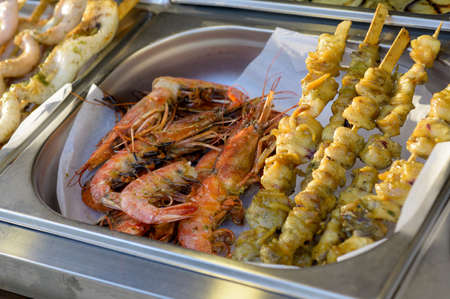 Grilled seafood at a street food festivalの写真素材