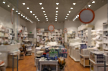 Abstract blur and defocused clothing department store in shopping mall interior for background