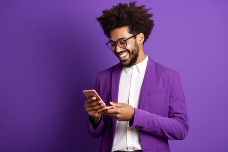 man with phone on purple backgroundの素材