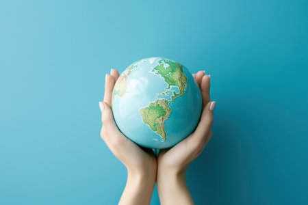 World Environment Day. Earth globe in woman handsの素材
