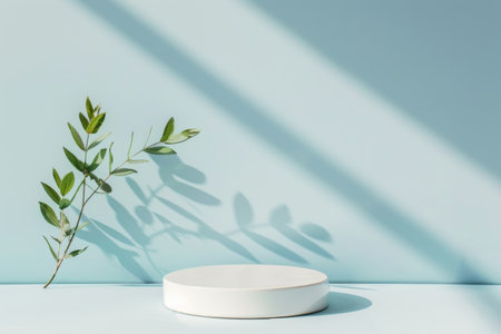 Glossy white ceramic product display podium on a pastel blue background: Clean and fresh, perfect for minimalist designs or summer-themed products, the white ceramic podium and pastel blue background evoke a sense of simplicity and calmの素材