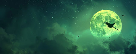 Halloween background with a witch's silhouette flying on a broomstick across the moon.の素材