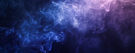 Blue and pink smoke on a black background. Background from the smoke of vapeの素材