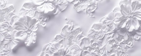 Elegant lace background in pure white with intricate patterns and a delicate, soft texture. The luxurious, refined look adds a touch of sophistication and romance, ideal for high-end or wedding designsの素材