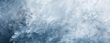 Ice background featuring a mix of snow and ice, with a texture that combines fluffy snowflakes and solid ice crystals. The palette is dominated by white, with hints of blue and gray.の素材