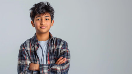 an Indian teenager showing determination on a studio backgroundの素材
