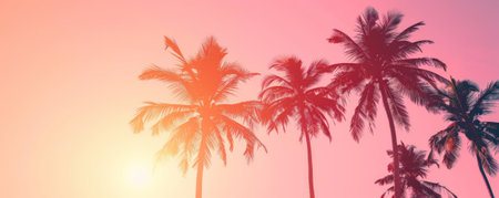 Summer vacation concept on a pink background showing a tropical sunset. Palm trees silhouetted against a vibrant pink and orange sky create a breathtaking, serene scene.の素材