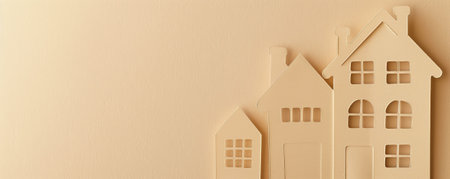 A cut-out paper banner in the shape of a house, with detailed window and door cutouts, layered over a warm beige background, creating a cozy and homey effect.の素材