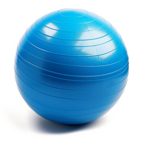 A versatile exercise ball in bright blue, isolated on white backgroundの素材