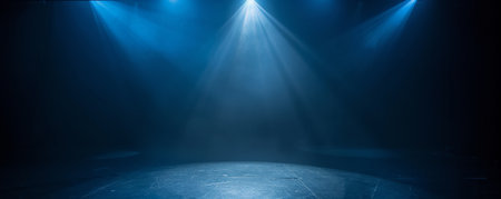 A minimalist dance stage with a single blue spotlight illuminating the center. The background is dark, with subtle blue light accents creating a calm and focused atmosphere.の素材