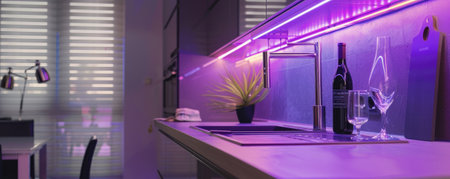 A modern kitchen with a sophisticated ambiance, with LED strips casting a vibrant, colorful light on the stylish countertops and contemporary decor, creating a chic retreat.の素材