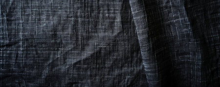A pristine black background with a subtle fabric-like texture, adding a touch of elegance and sophistication.の素材