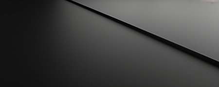 A clean black background with a smooth surface, ideal for a modern and minimalistic design.の素材