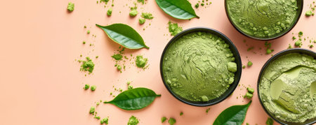Mockup of matcha tea powder with leaves on a light peach background, creating a warm and inviting atmosphere for your design.の素材