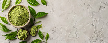 Mockup of matcha tea powder with leaves on a light gray background, offering a neutral and modern backdrop with room for text or graphics.の素材