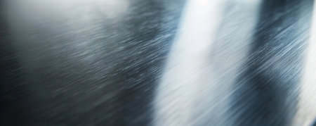 A brushed stainless steel surface with a sleek, modern design and a subtle matte finish.の素材