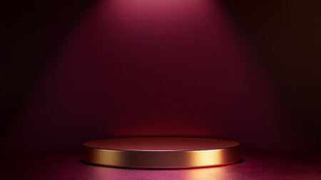 A glossy round podium in rich gold, set in front of a deep burgundy background. Warm, focused lighting from above creates a luxurious and refined atmosphere, perfect for premium products.の素材