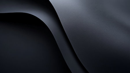 A sleek dark gradient from charcoal gray to jet black, with a smooth, minimalistic finish for a dramatic and modern look.の素材