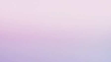 A soft gradient transitioning from powder pink to pastel lilac, with smooth color blending for a dreamy, delicate background.の素材
