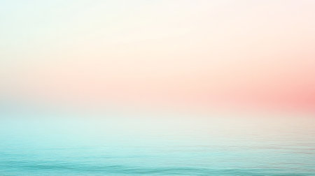 A soft gradient of light blue transitioning into soft coral, with gentle color blending creating a calming, tranquil atmosphere for the background.の素材