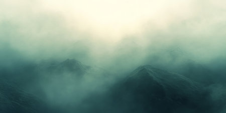 Ethereal misty landscape background with soft fog rolling over hills, creating a sense of mysteryの素材