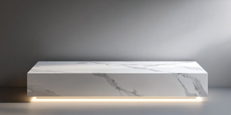 A sleek white stone podium for product display, featuring a polished marble surface with subtle gray veins and soft lightingの素材