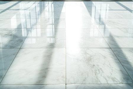 Polished marble floor texture, intricate veining in white and gray tones, with faint reflections of soft lightの素材