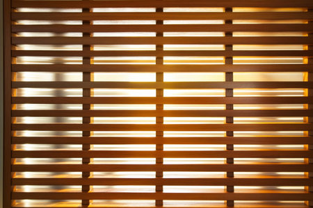 A contemporary wooden slatted wall background with evenly spaced horizontal planks, offering a modern and structured aesthetic for a chic interior design.の素材