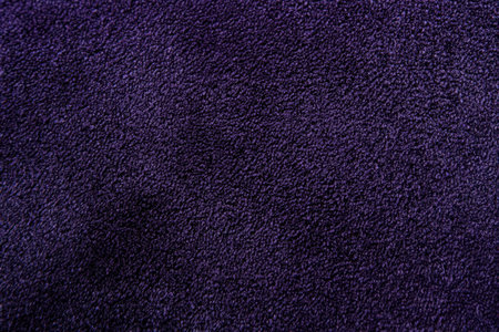 Smooth velvet fabric texture, deep purple tones with a soft, luxurious sheen, elegant and tactileの素材
