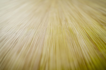 Textured bamboo surface, smooth green stalks with fine natural grooves and subtle light reflections, fresh and organicの素材