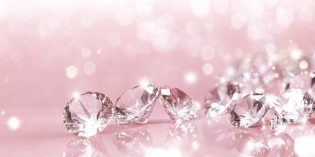 A soft pink background adorned with sparkling diamonds scattered across the surface. The gentle reflections and twinkling highlights create a refined, delicate atmosphere, making it ideal for luxury event invitations or glamorous product designs.の素材