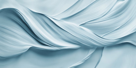 A soft blue background with delicate strokes resembling watercolor, blending in and out to create an organic, textured feel. Ideal for artistic portfolio websites, abstract art projects, or gentle digital invitations.の素材