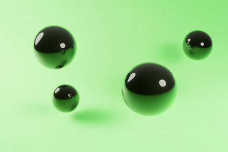 minimalist design featuring smooth black spheres floating in space with a soft light green glow around them, creating a serene and elegant atmosphere.の素材