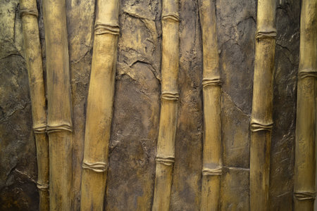 Textured bamboo forest trunks, smooth yet etched with natural lines and age, adding depth and tranquility to the scene.の素材