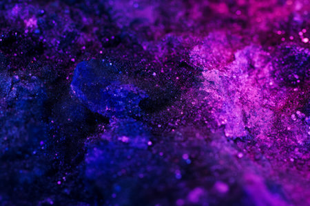 A deep purple and magenta abstract background with cosmic dust textures and glowing nebula-like effects. A dreamy and surreal aesthetic.の素材