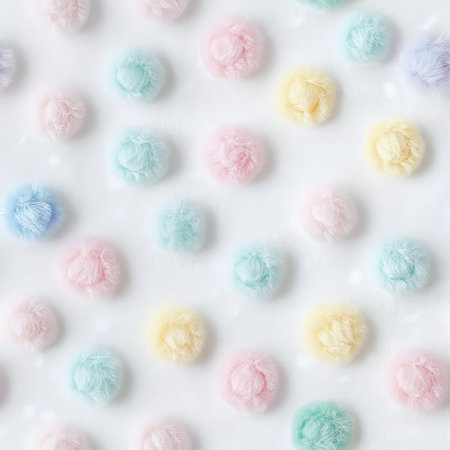 A polka dot pattern with fuzzy textured circles in pastel hues, looking like soft cotton balls scattered on a white surfaceの素材