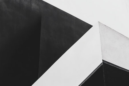 A minimalist composition featuring bold geometric shapes, sharp angles, and a restricted monochrome palette. The balance between negative space and form creates a sleek, modern aesthetic.の素材