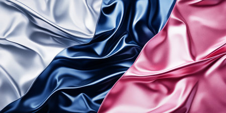 A radiant, colorful abstract background with liquid metal textures. The smooth, reflective surfaces in bright silver, deep blue, and soft pink create a futuristic, polished, and visually fluid metallic effect.の素材