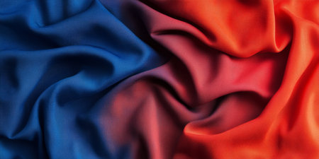 A stunning ombre fabric texture background with a smooth gradient transition from royal blue to fiery red. The soft, blended tones add depth and visual intrigue, perfect for artistic, modern, and dynamic textile compositions.の素材