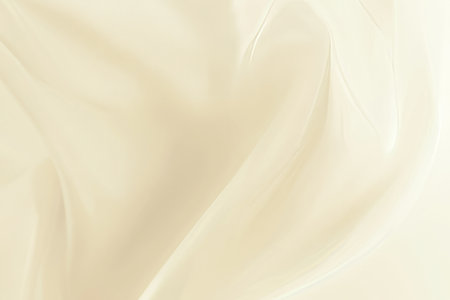 A fine silk fabric texture background in soft champagne. The lightweight, flowing material with gentle folds and subtle sheen is perfect for bridal gowns, evening dresses, and luxury interiors.の素材