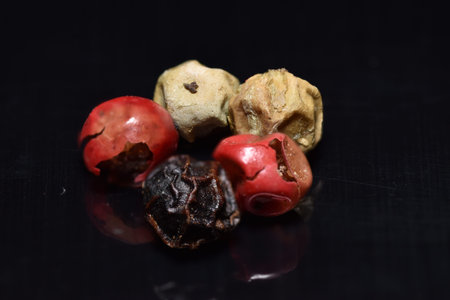 Five fruits of red, white and black pepperの写真素材