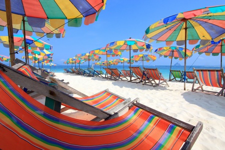 Beach chair and colorful umbrella on the beach , Phuket Thailand の写真素材