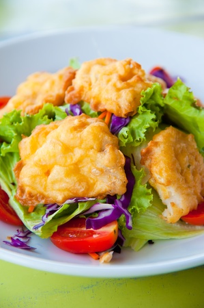 Delicious salad with fish, vegetable and dipping sauceの写真素材