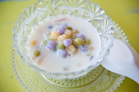 Thai sweetmeat with colorful ball flour, coconut, milk and egg : popular and famous thialand dessert (Bua Loi)の写真素材